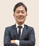 Dr Roger Anthony Idi